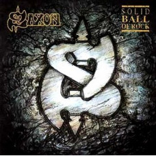 Вінілова платівка Saxon – Solid Ball Of Rock (LP, Album, Limited Edition, Numbered, Reissue, Gold Vinyl)